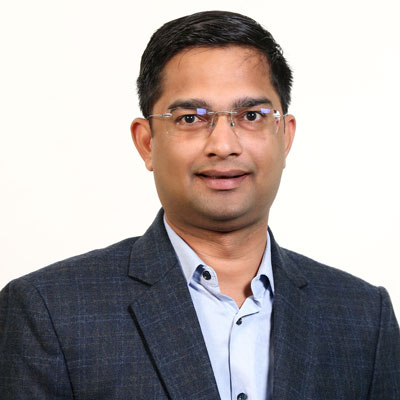 A headshot of Dr. Rakesh Garg, Executive Medical Officer at REAN Foundation